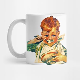 Red-haired boy eating Mug